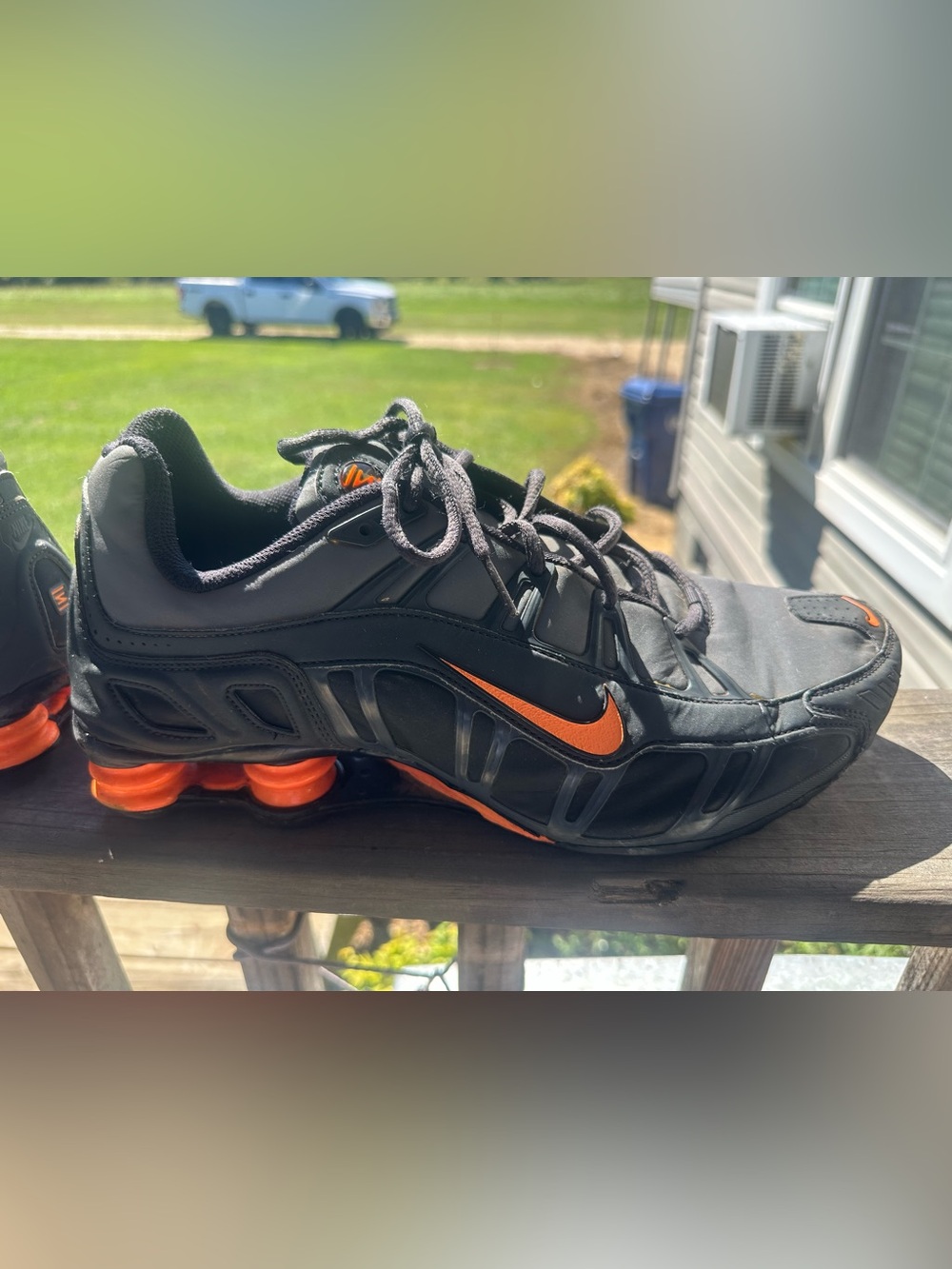 Nike Men’s Black Shox Athletic Sneakers with Orange Accents